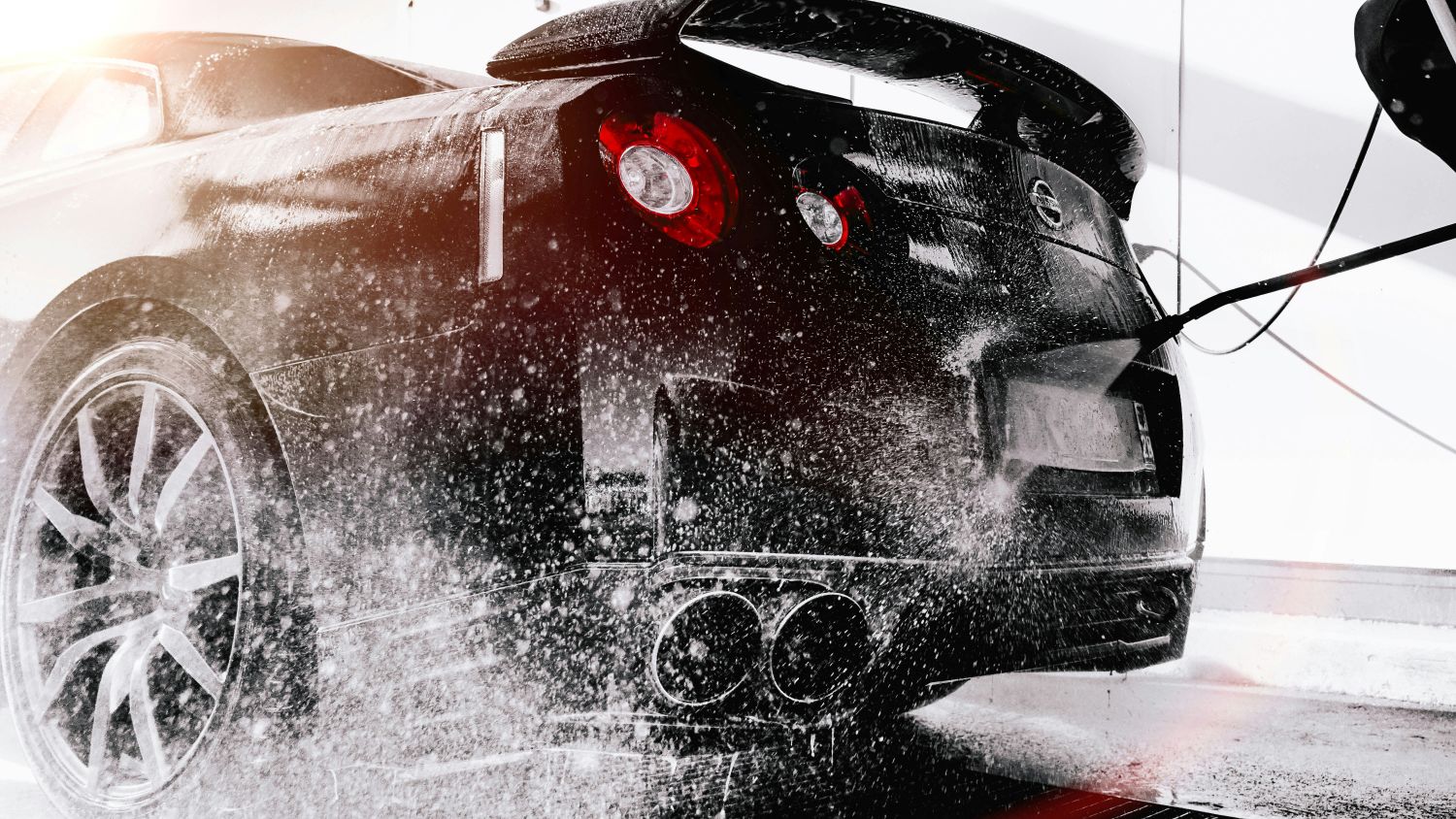 Black Nissan is being washed - Japanese imported cars Australia