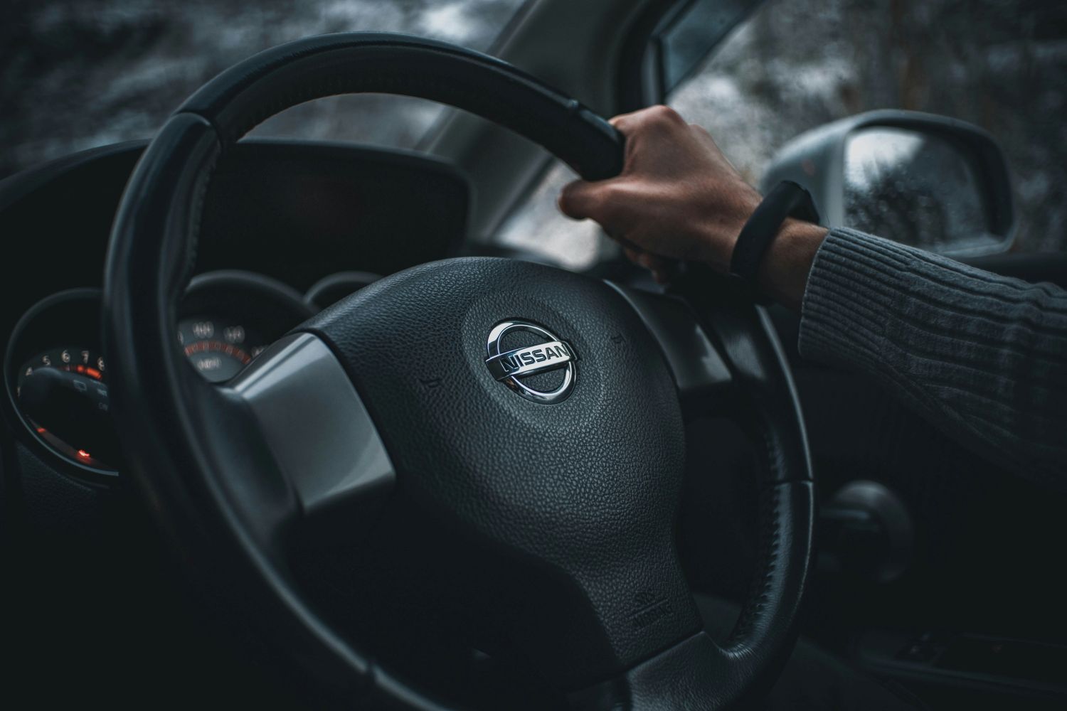 Japanese imported cars Australia: Close up of a Nissan steering wheel